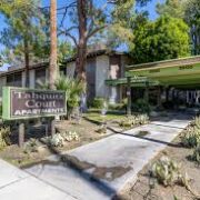 Logo for Tahquitz Court Apartments Logo for Tahquitz Court Apartments